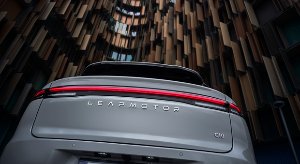 Rear view of a grey Leapmotor C10 car with a horizontal light strip.