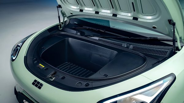 Car bonnet open showing front storage compartment.