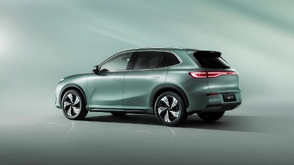 Green SUV, rear side view, with LED taillights and aerodynamic design.