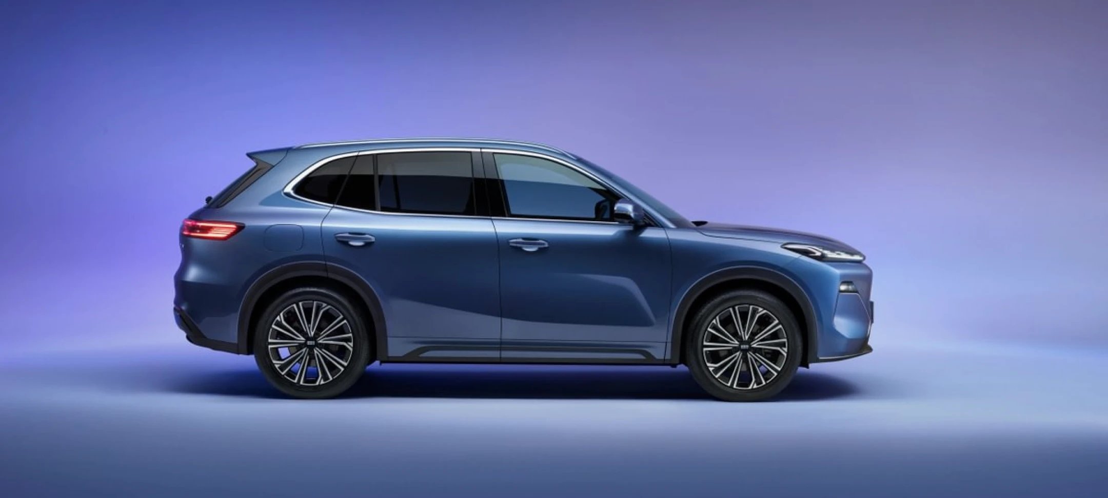 Side view of a blue SUV car.