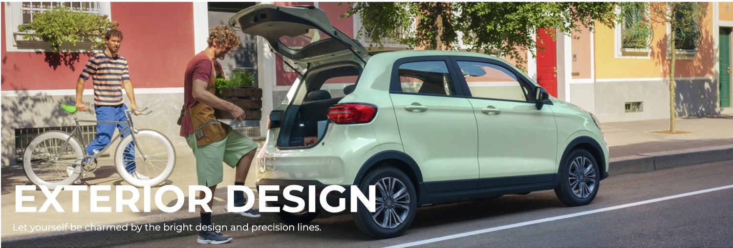 Man placing item in car boot while another man walks a bicycle nearby.